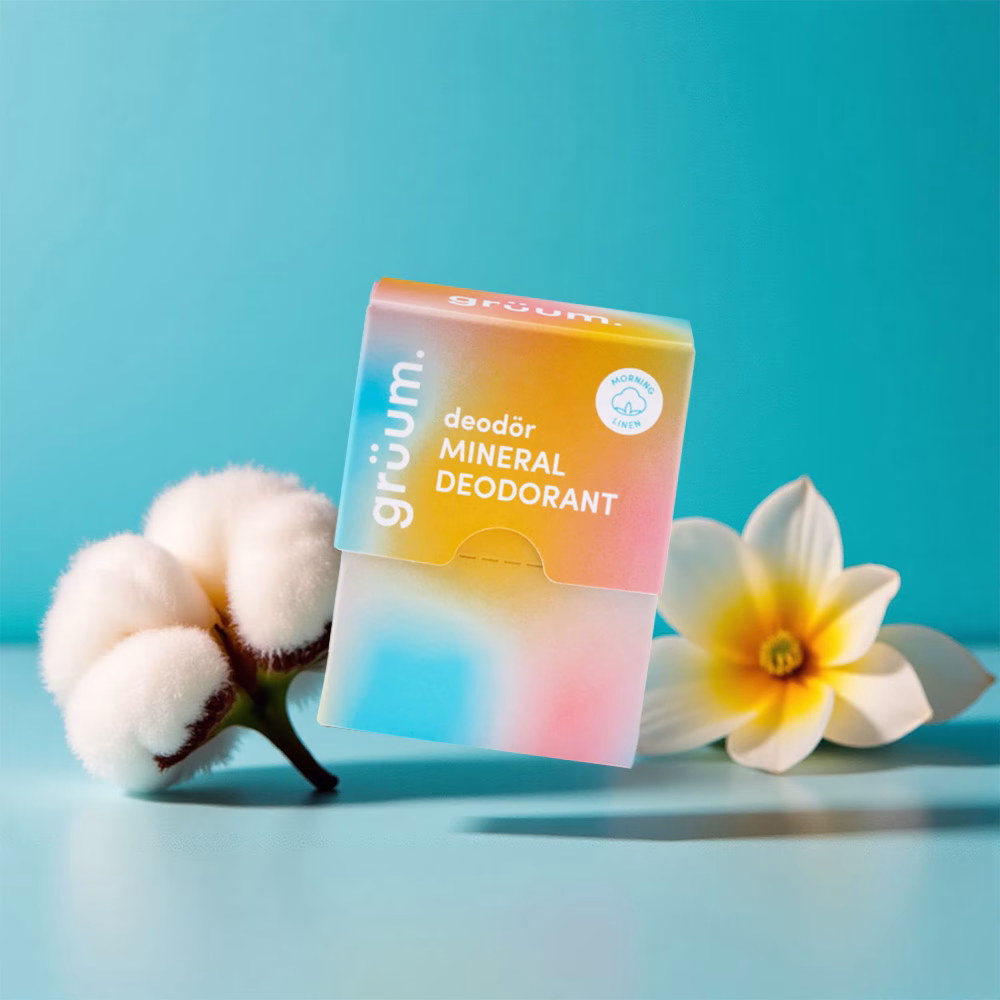 Deodorant box with cotton and flower.