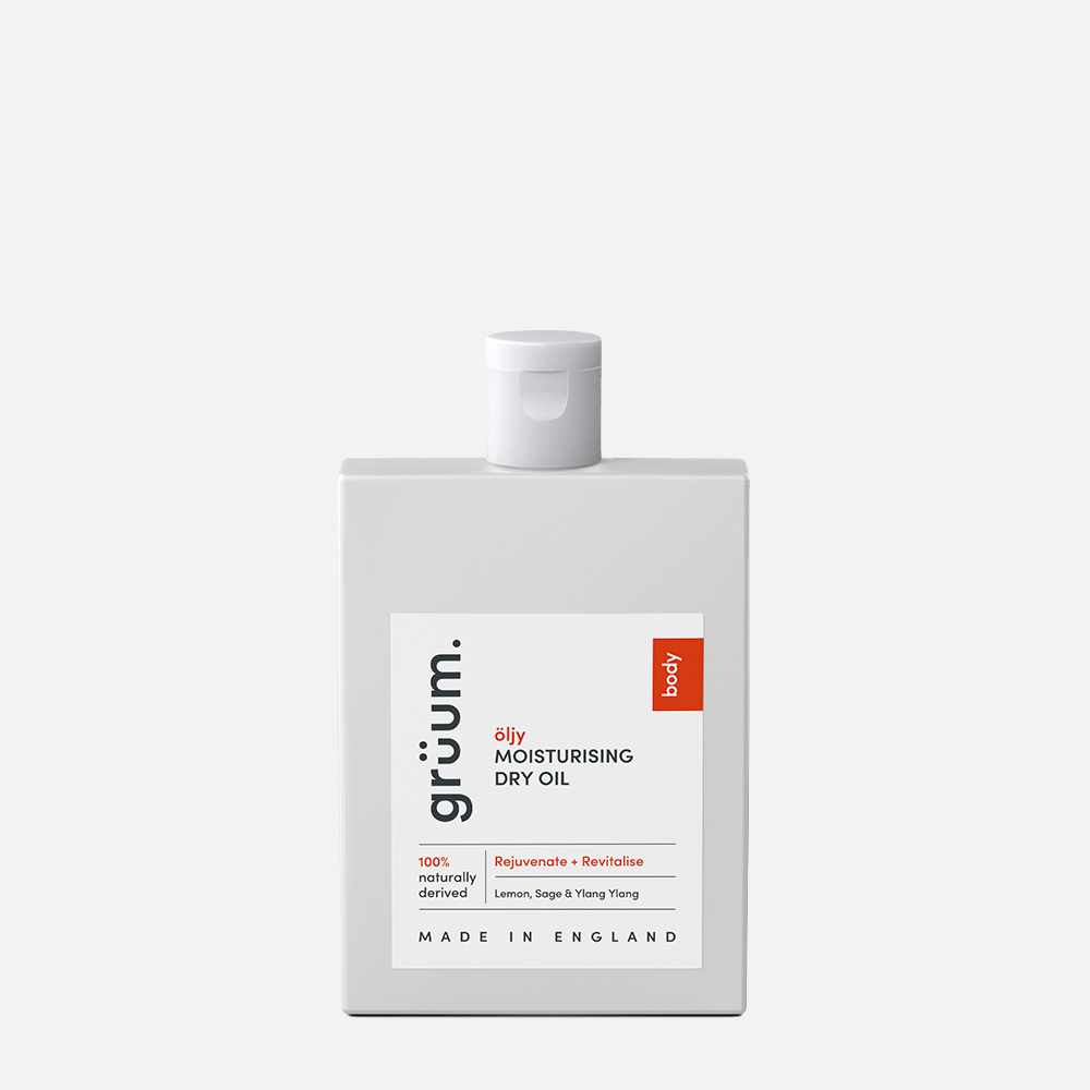 White bottle of moisturising dry oil.