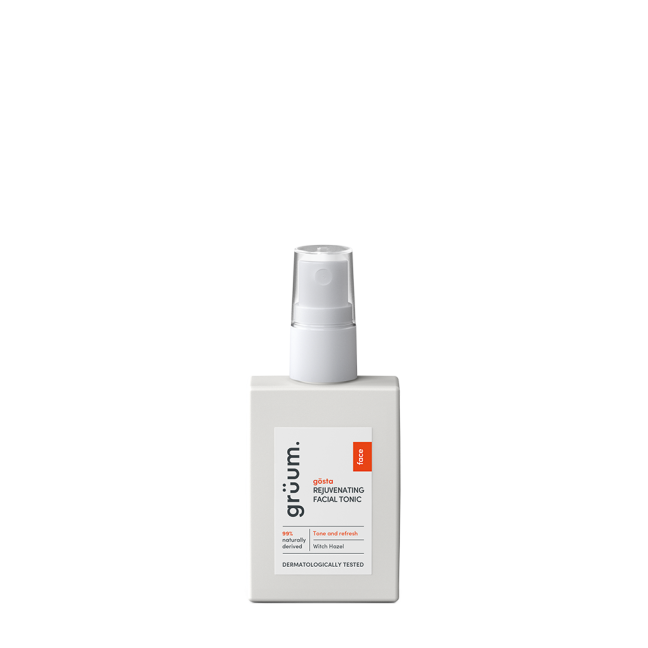Facial tonic bottle with pump dispenser.