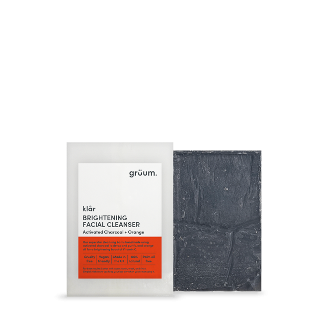 Facial cleanser with dark soap bar