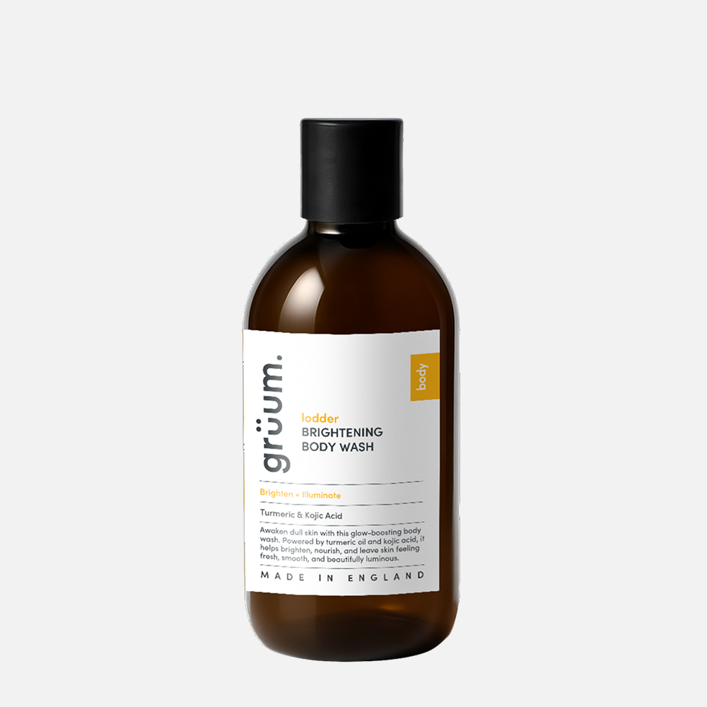 Brown bottle of brightening body wash.