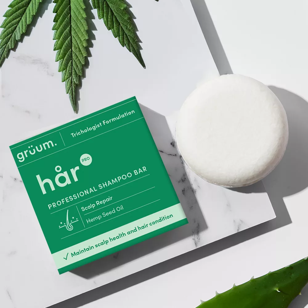 Shampoo bar with box and plants.