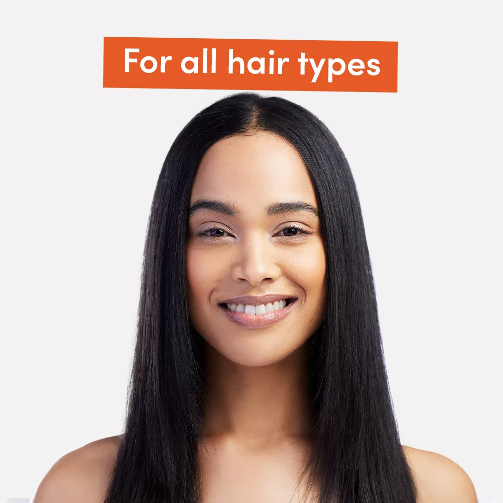 Woman smiling, suitable for all hair types
