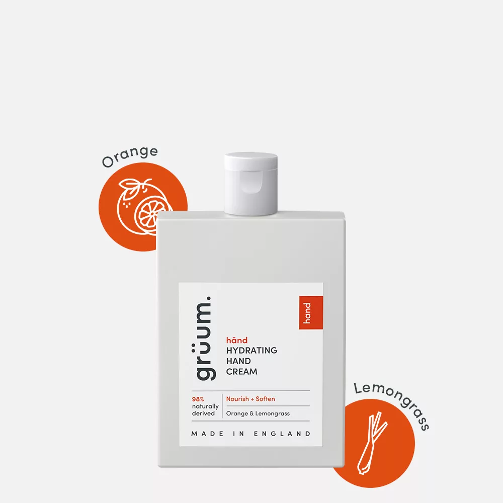Hydrating hand cream bottle with orange, lemongrass