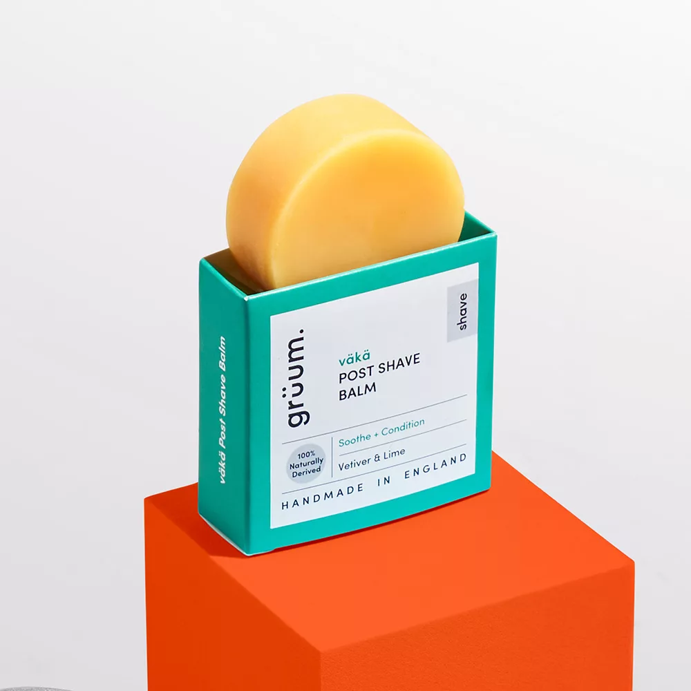 Yellow shaving balm in teal box